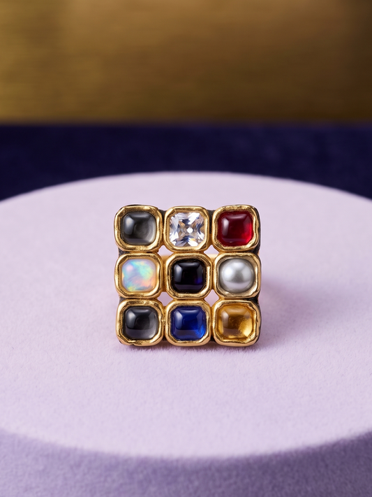 Bold handcrafted Navratan Kundan statement ring featuring multicolor gemstone-inspired detailing and radiant 22Kt gold plating designed for timeless sophistication.