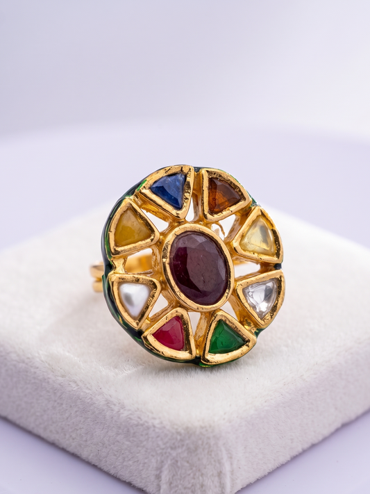 Handcrafted adjustable Navratan Kundan ring made in India with multicolor gemstone-inspired detailing and radiant 22Kt gold plating inspired by royal Indian jewelry.